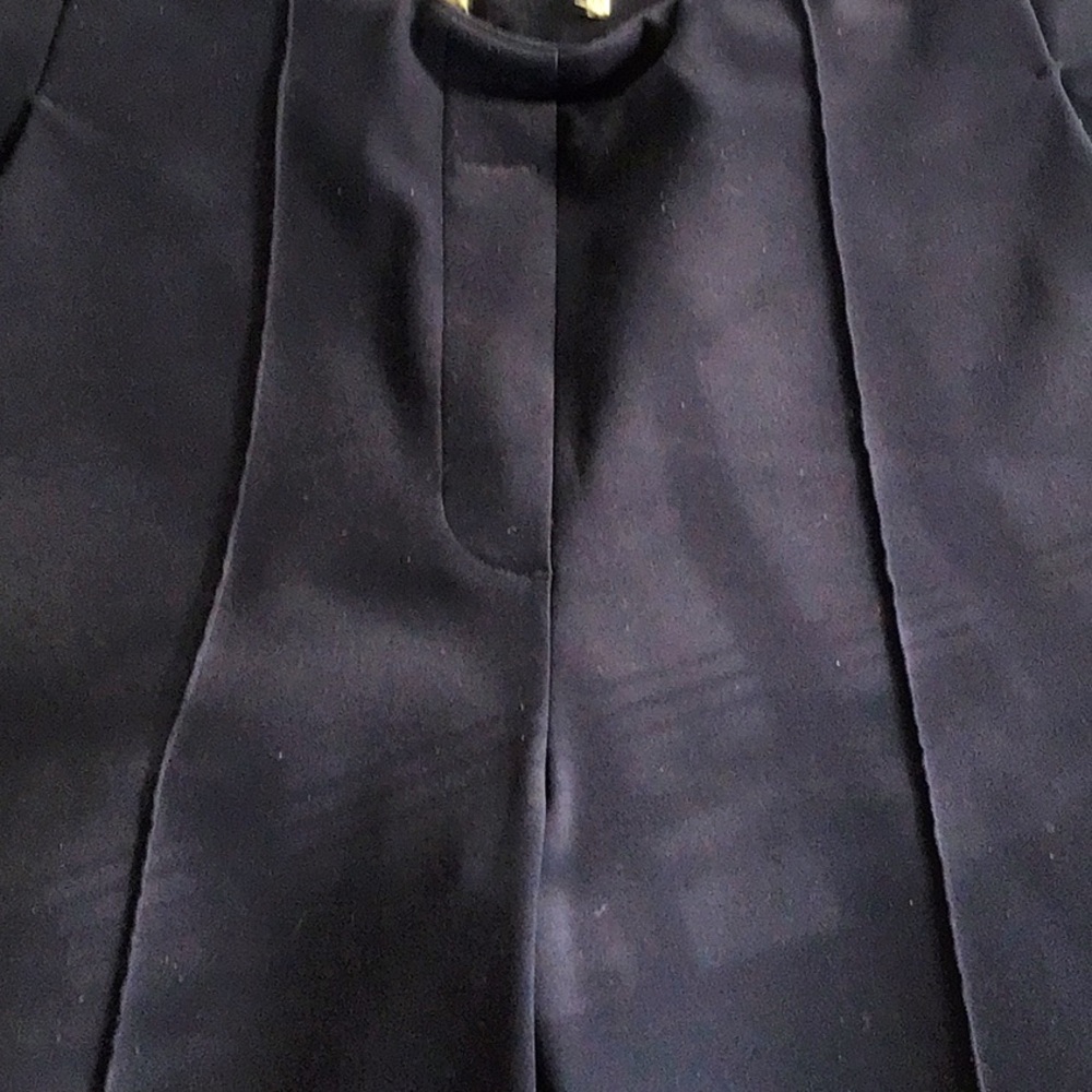 Rachel Zoe navy pipped leg. Slit hem slacks. Cut out tag. Itchy